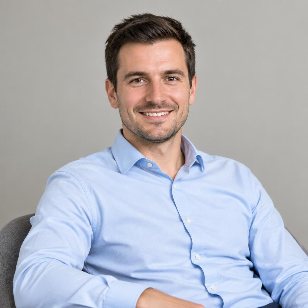 Portrait of a young man with short hair and a shirt