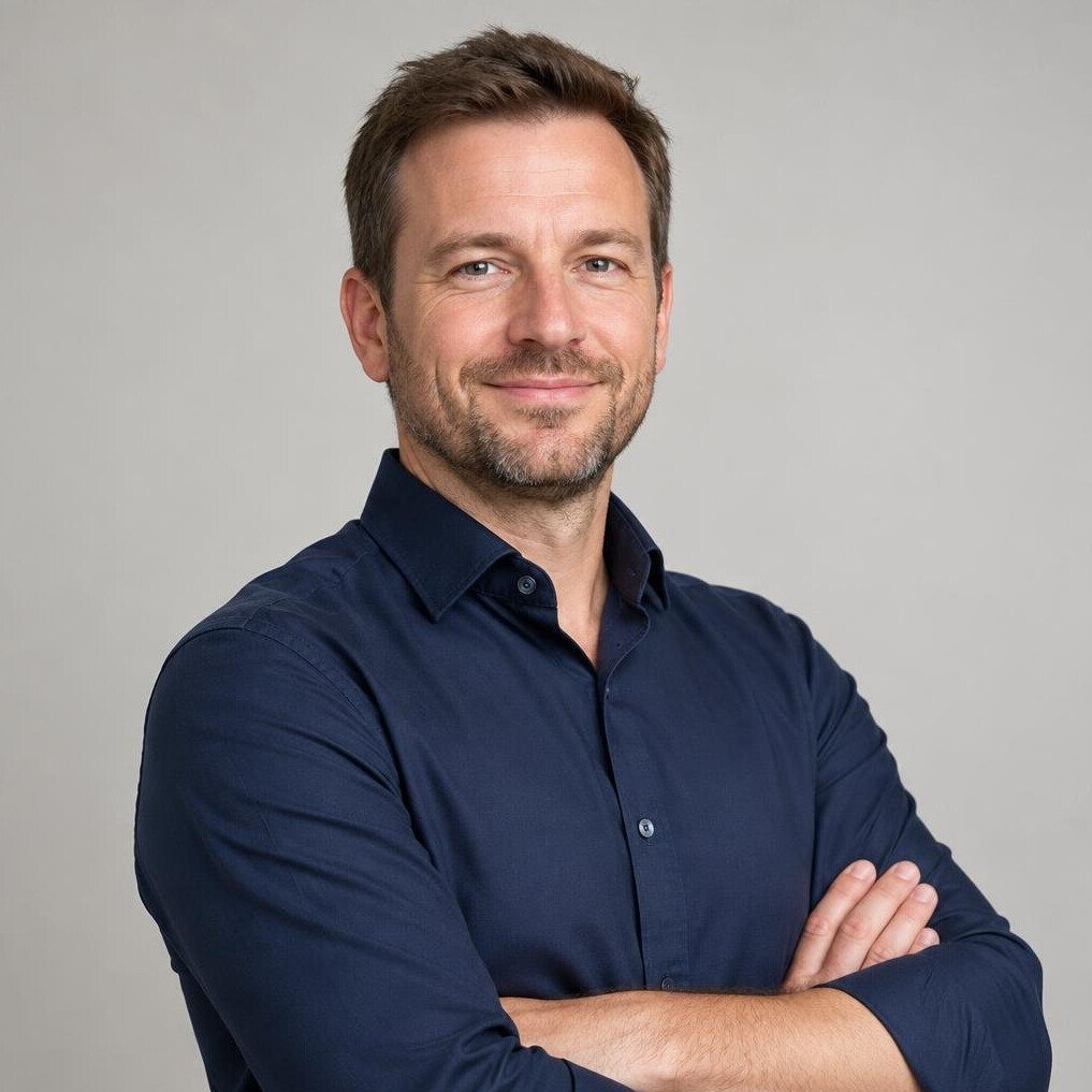 Portrait of a bearded man in a business casual shirt